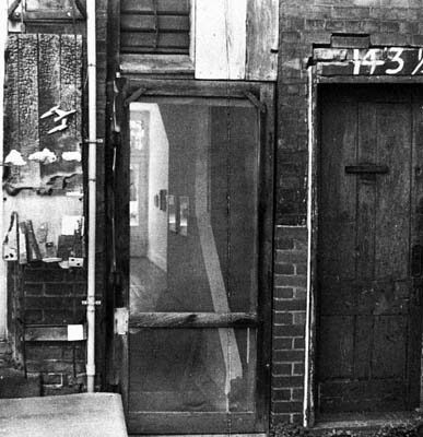 Hamilton Artist Inc. backdoor, 1981 with my UFO piece on wall